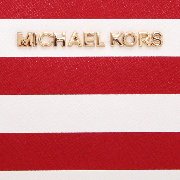 Red and white striped michael kors purse on sale