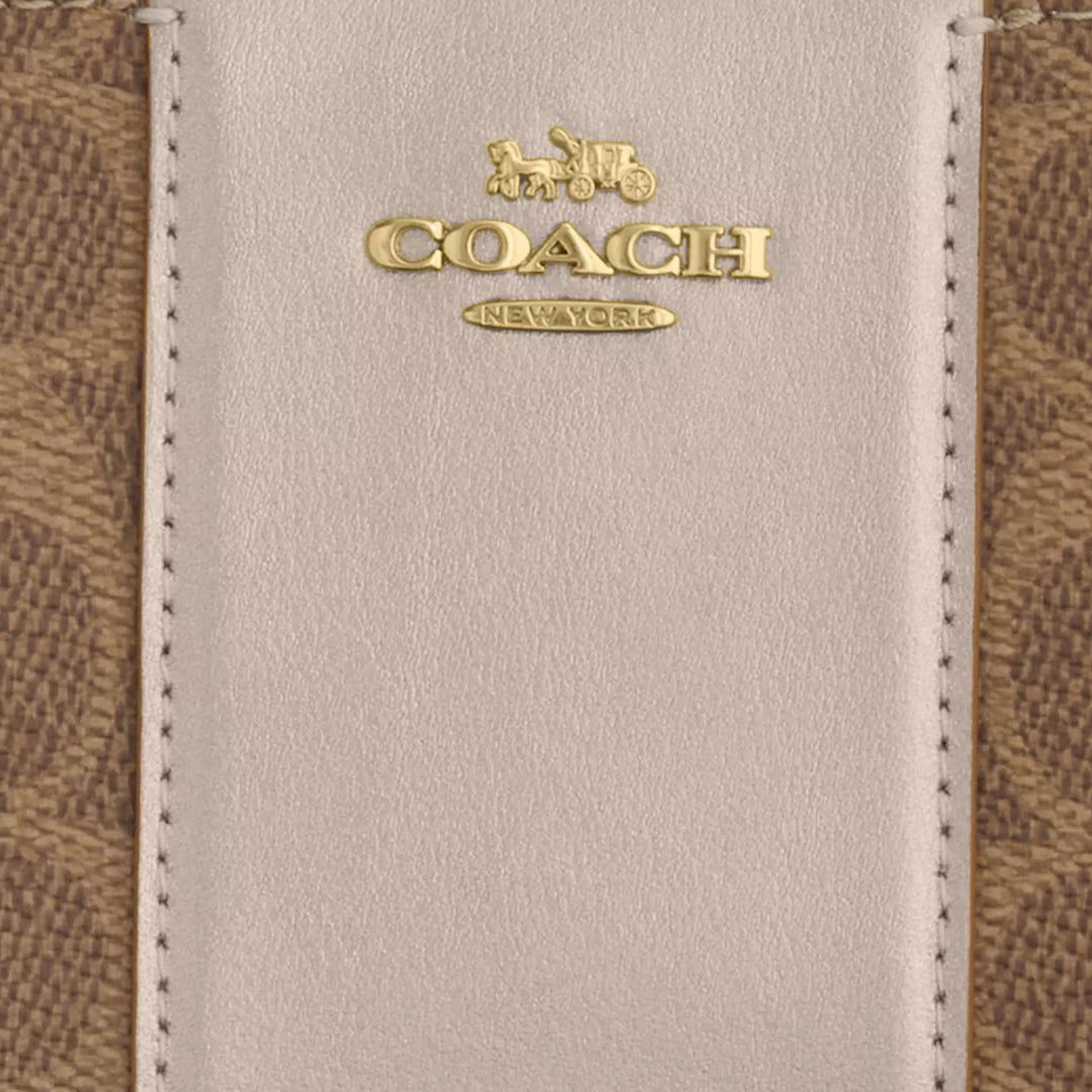 Buy Coach Boxed Long Zip Around Wallet In Signature Canvas in Tan