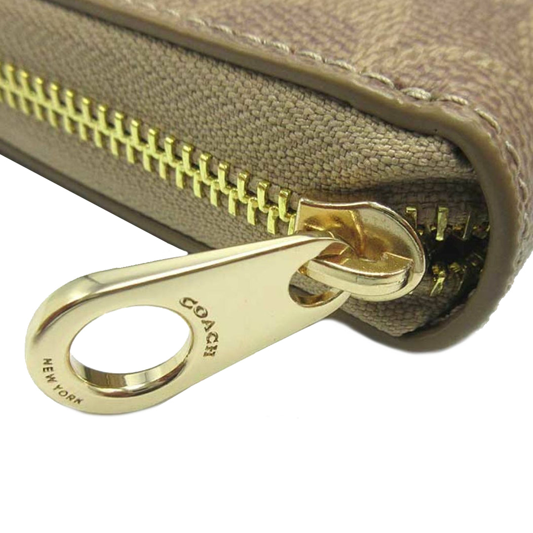 Buy Coach Boxed Long Zip Around Wallet In Signature Canvas in Tan