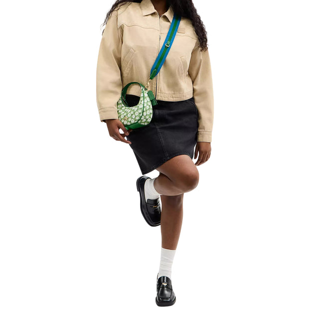 Model Wearing Coach Carmen Mini Crossbody Bag With Floral Print - Kelly Multi CBI58