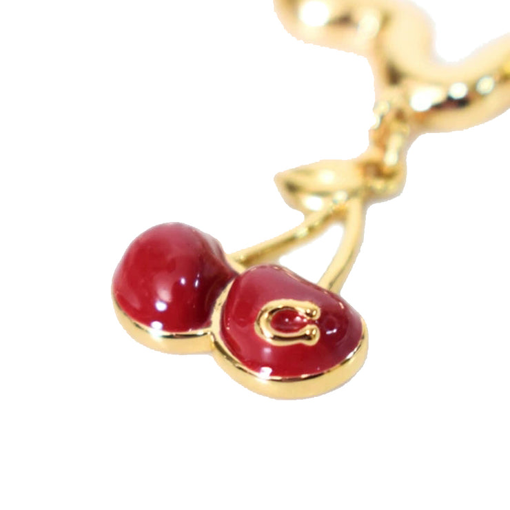 Closeup of Coach Cherry Wavy Huggie Earrings - Red CAA16