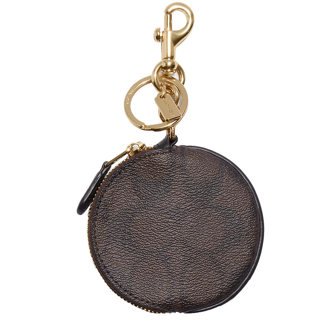 Buy Coach Circular Coin Pouch In Signature Canvas in Brown/ Black
