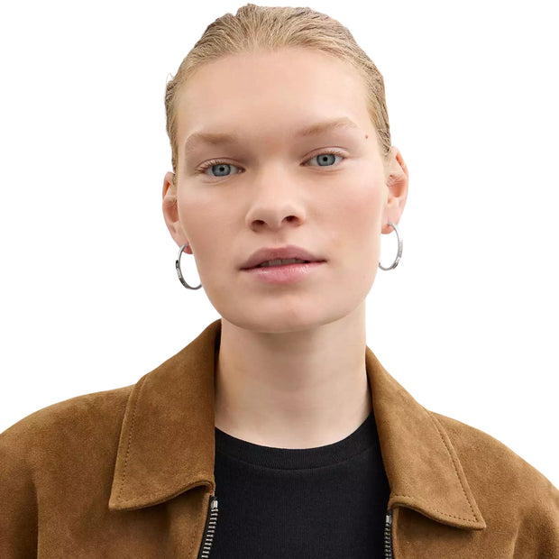 Model Wearing Coach Medium Hoop Earrings - Silver CBW17