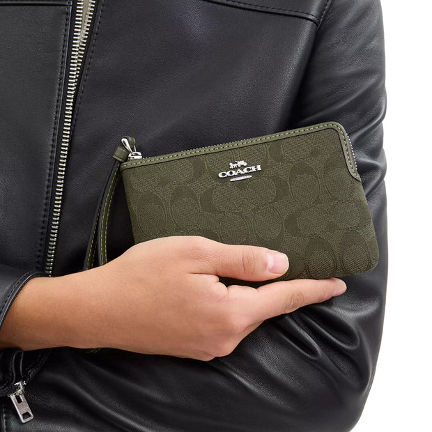 Model View of Coach Corner Zip Wristlet In Signature Jacquard - Olive Drab/ Olive Drab CW862
