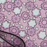 Closeup of Coach Corner Zip Wristlet With Floral Print - Lily Multi CBP28