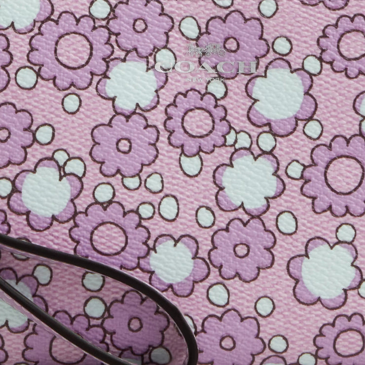 Closeup of Coach Corner Zip Wristlet With Floral Print - Lily Multi CBP28
