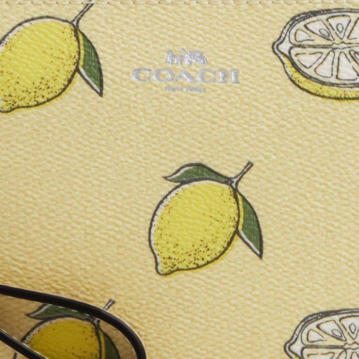 Closeup of Coach Corner Zip Wristlet with Lemon Print - Garden Glade Multi CBB80