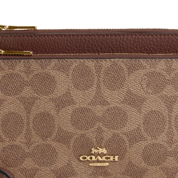 Closeup of Coach Double Zip Wallet In Signature Canvas - Tan/ Brown CX161