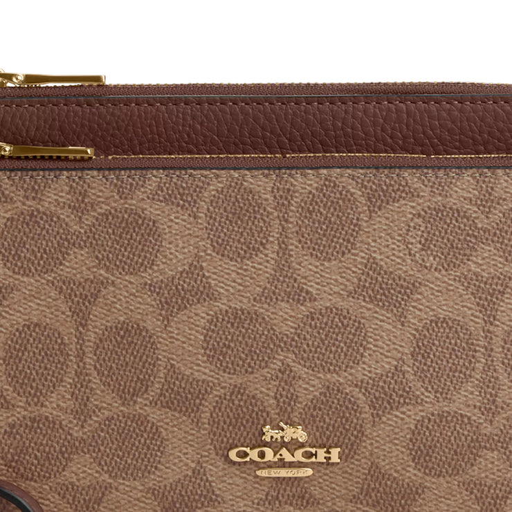 Closeup of Coach Double Zip Wallet In Signature Canvas - Tan/ Brown CX161