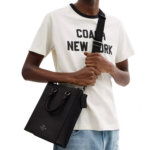 Model Wearing Coach Dylan Tote Bag in Black CT910