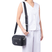 Female Model Wearing Coach Elias Crossbody Bag - Black CJ509