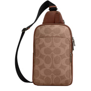 Front View of Coach Ethan Pack Bag In Signature Canvas - Tan/ Vintage Brown CBI71