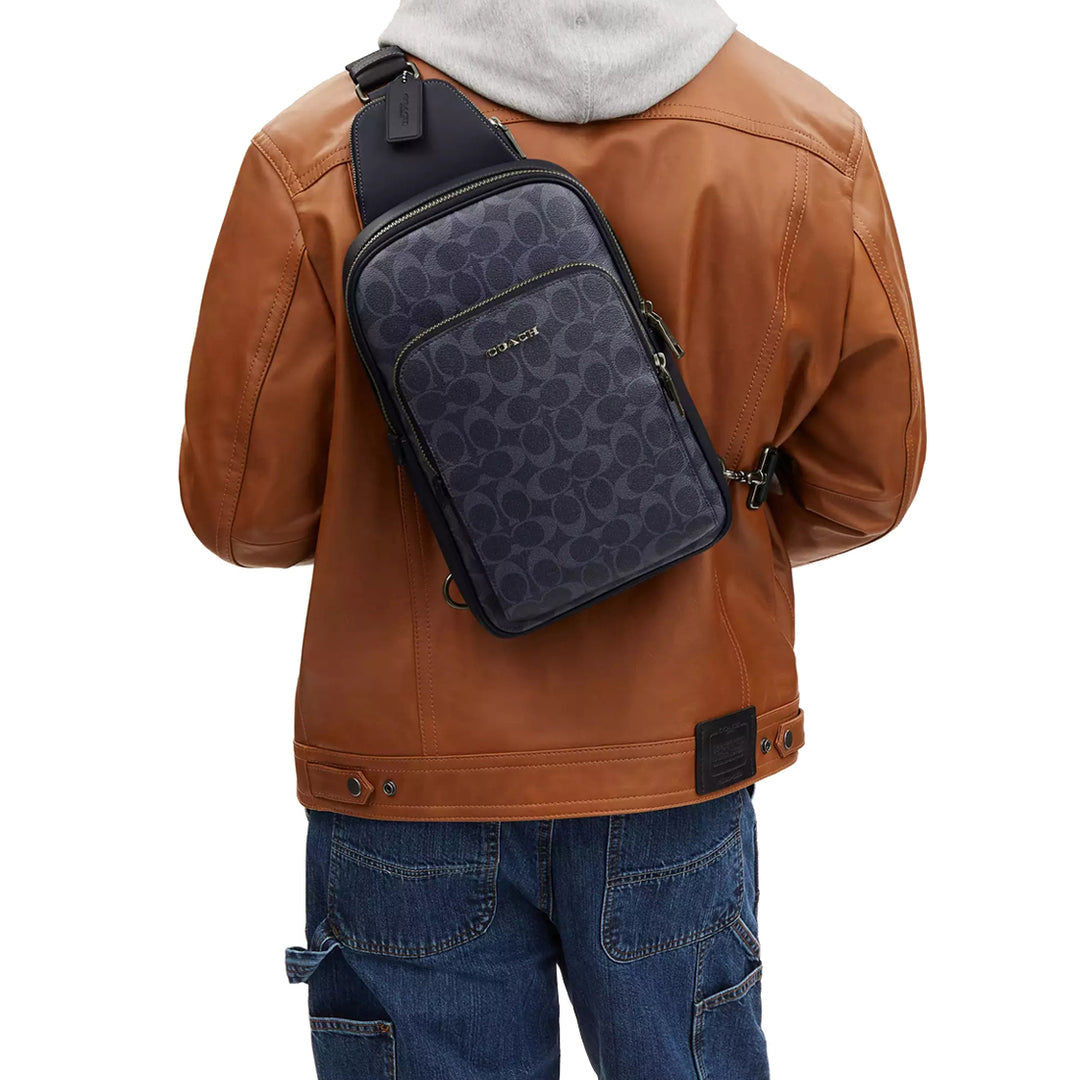 Buy Coach Ethan Pack Bag In Signature Denim in Denim/ Midnight