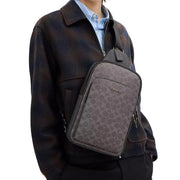 Model Wearing Coach Ethan Pack Bag In Signature Canvas Bag - Grey/ Charcoal CZ393
