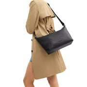 Model Wearing Coach Finn Crossbody Bag - Black CAJ70