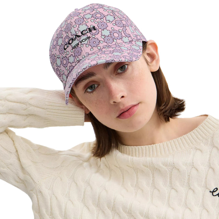 Female model wearing Coach Floral Print Baseball Hat in Purple CBO67 (M/L)
