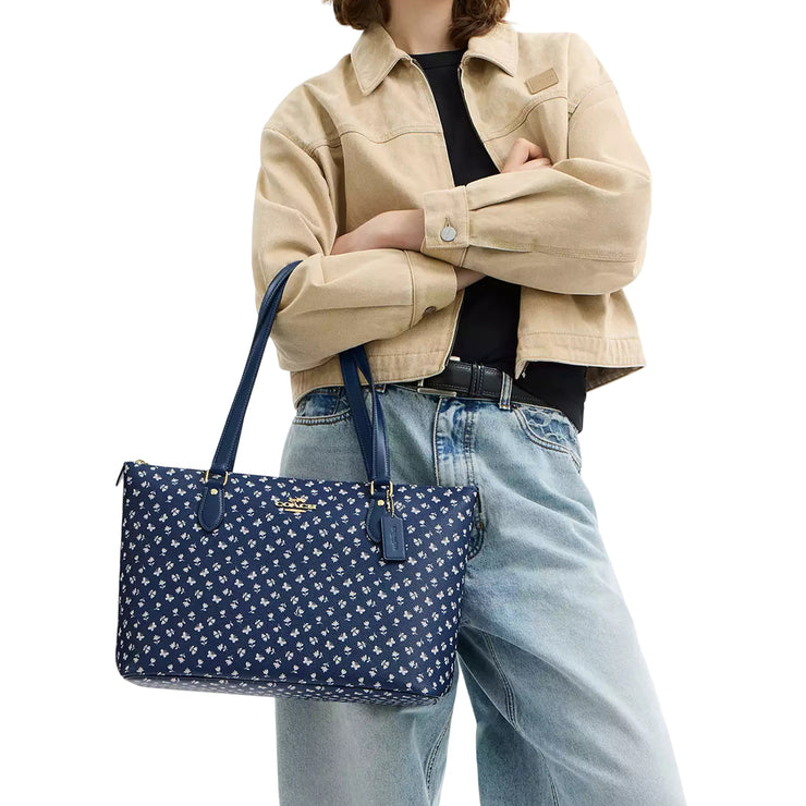 Model Carrying Coach Gallery Tote Bag With Floral Print - Deep Blue Multi CBM20
