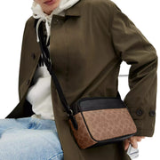 Buy Coach Graham Crossbody Bag In Signature Canvas in Tan/ Black CV921 Online in Singapore | PinkOrchard.com