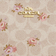 Closeup of Coach Large Corner Zip Wristlet In Signature Canvas - Sand Multi CBA72