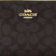 Closeup of Coach Large Corner Zip Wristlet In Signature Canvas - Walnut/ Black CZ277