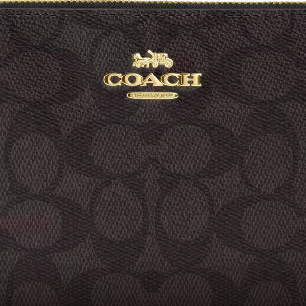 Closeup of Coach Large Corner Zip Wristlet In Signature Canvas - Walnut/ Black CZ277