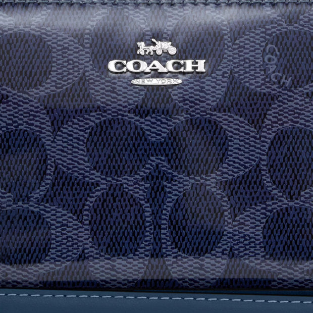 Closeup of Coach Long Zip Around Wallet In Signature Canvas - Dark Denim CAO78
