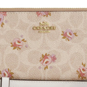 Closeup of Coach Long Zip Around Wallet In Signature Canvas With Floral Print - Sand Multi CAR06