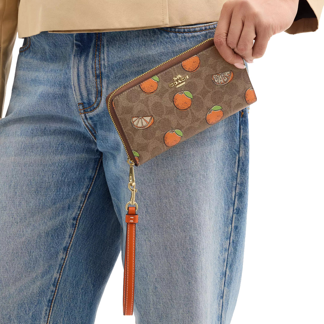Buy Coach Long Zip Around Wallet In Signature Canvas With Orange