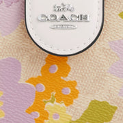Closeup of Coach Medium Corner Zip Wallet In Signature Canvas With Floral Print - Sand Multi CBO30