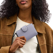 Model Holding Coach Medium Corner Zip Wallet- Mist CBO41