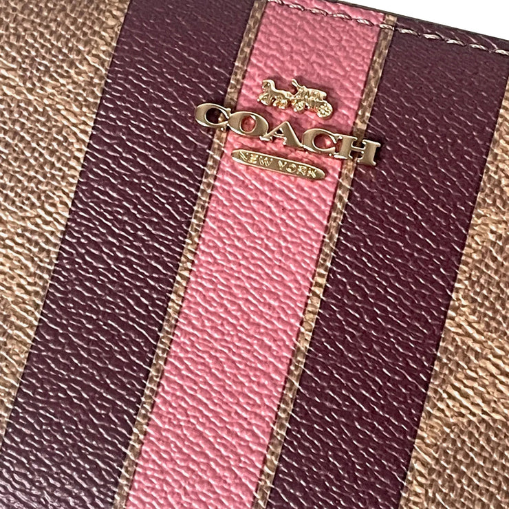 Closeup of Coach Medium Id Zip Wallet In Signature Canvas With Varsity Stripe - Tan Multi CBO79