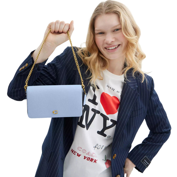 Model Carryng Coach Mila Crossbody Bag - Bluebell CAO01