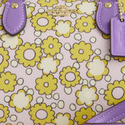 Closeup of Coach Mini Rowan Crossbody Bag With Floral Print - Lilac Multi CBM69