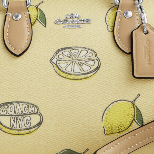 Closeup of Coach Mini Rowan Crossbody Bag With Lemon Print - Garden Glade Multi CAL19