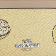 Closeup of Coach Mini Skinny Id Case With Lemon Print - Garden Glade Multi CAR18