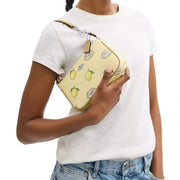 Model Wearing Coach Nolita 19 Wristlet/ Top Handle/ Clutch Bag With Lemon Print - Garden Glade Multi CAL26