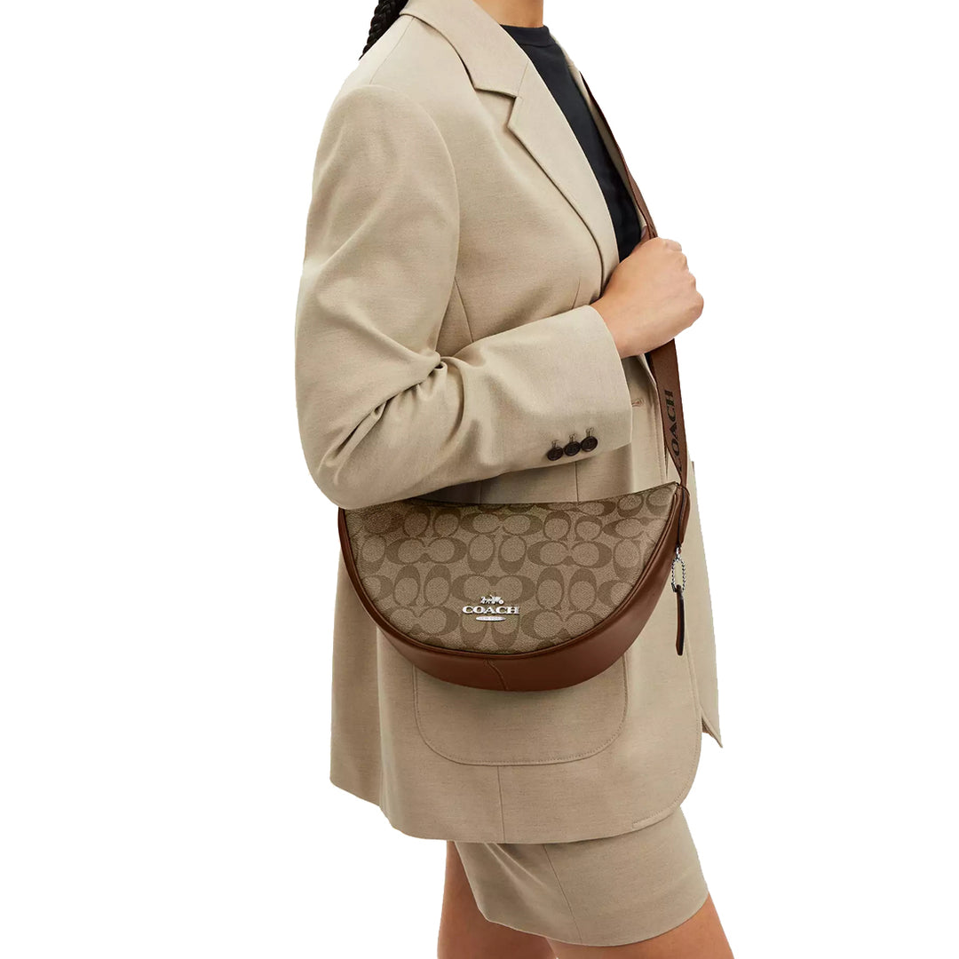 Buy Coach Pace Shoulder Bag In Signature Canvas in Khaki Saddle