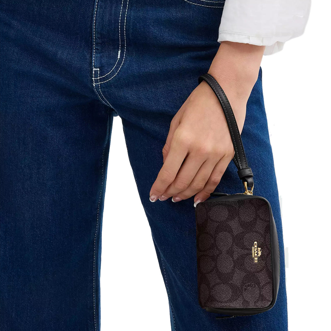 Buy Coach Pouch Wristlet In Signature Canvas in Walnut