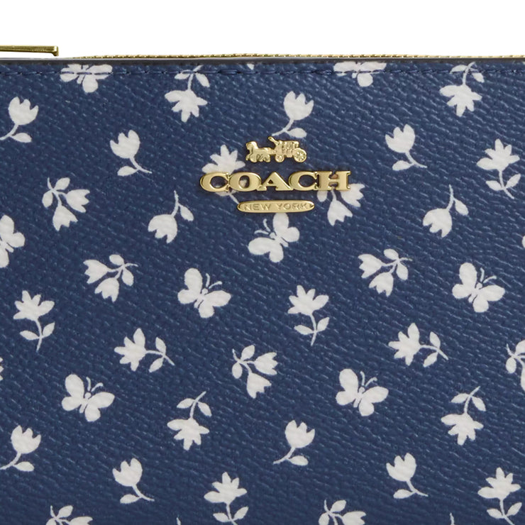 Closeup of Coach Slim Zip Wallet With Floral Print - Deep Blue Multi CBO24