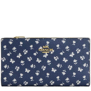 Front View of Coach Slim Zip Wallet With Floral Print - Deep Blue Multi CBO24
