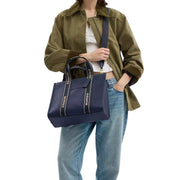 Model Wearing Coach Smith Tote Bag - Denim Multi CBM10