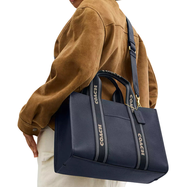 Model Wearing Coach Smith Tote Bag - Denim Multi CBM10