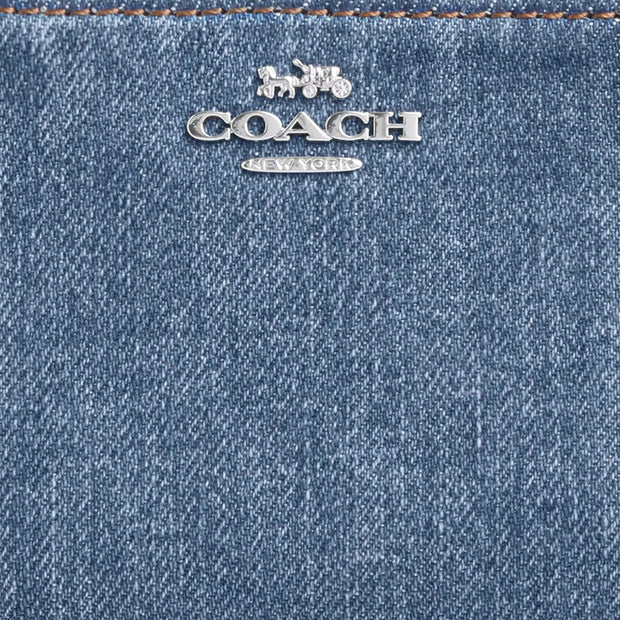 Closeup of Coach Snap Wallet - Indigo CAP07