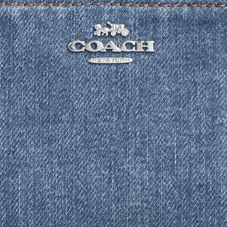 Closeup of Coach Snap Wallet - Indigo CAP07