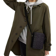 Model Wearing Coach Sullivan Crossbody Bag In Signature Canvas - Charcoal/ Black CAT78