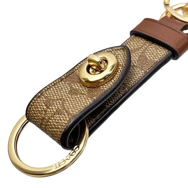 Buy Coach Trigger Snap Bag Charm In Signature Canvas in Khaki 49314 Online in Singapore | PinkOrchard.com