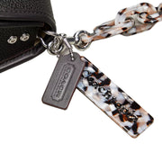 Closeup of Coach Wavy Dinky Bag In Coachtopia Leather - Black CK113