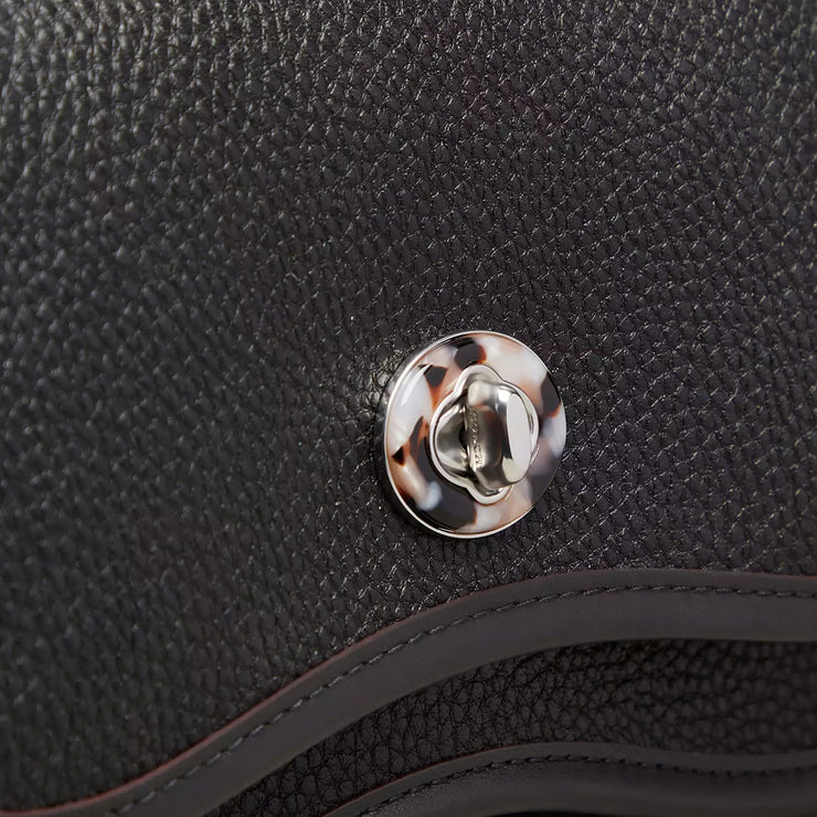 Closeup of Coach Wavy Dinky Bag In Coachtopia Leather - Black CK113