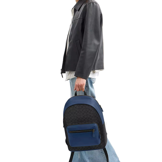 Model Carrying Coach West Backpack Bag In Colorblock Signature Canvas - Charcoal/ Deep Blue CAX44