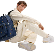 Model Wearing Coach West Backpack Bag With Baseball Print - Deep Blue Multi CAX47